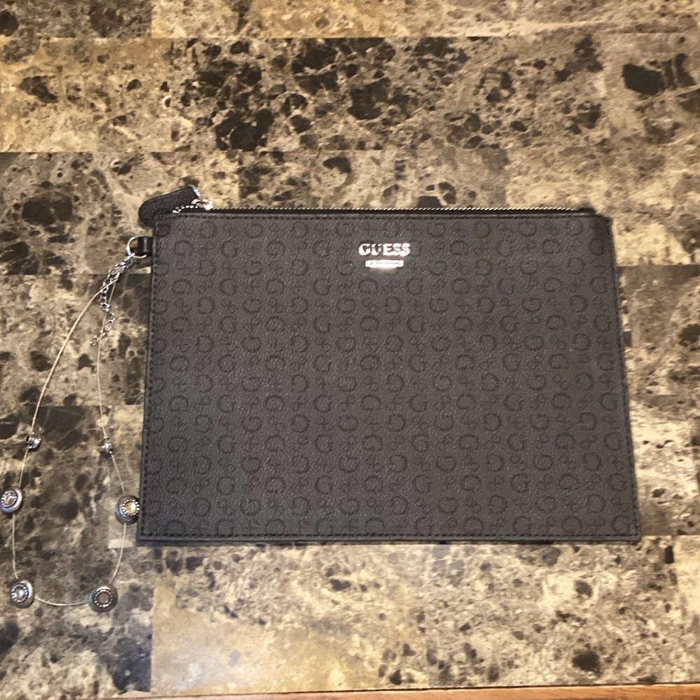 guess vintage logo clutch bag